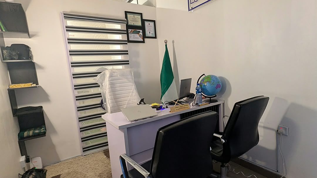 Management office with the Nigerian flag and globe